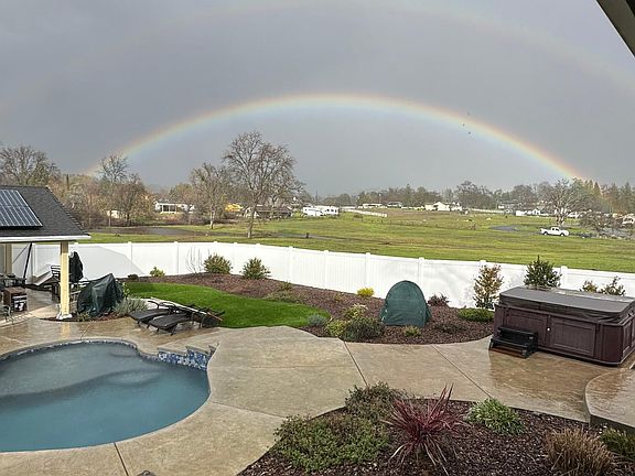 Standing on deck looking over pasture