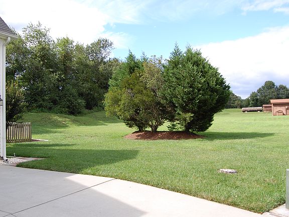 R side of home / Open field