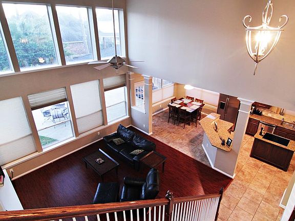 High ceilings makes this home open and spacious! This picture really shows how open the floor plan is!