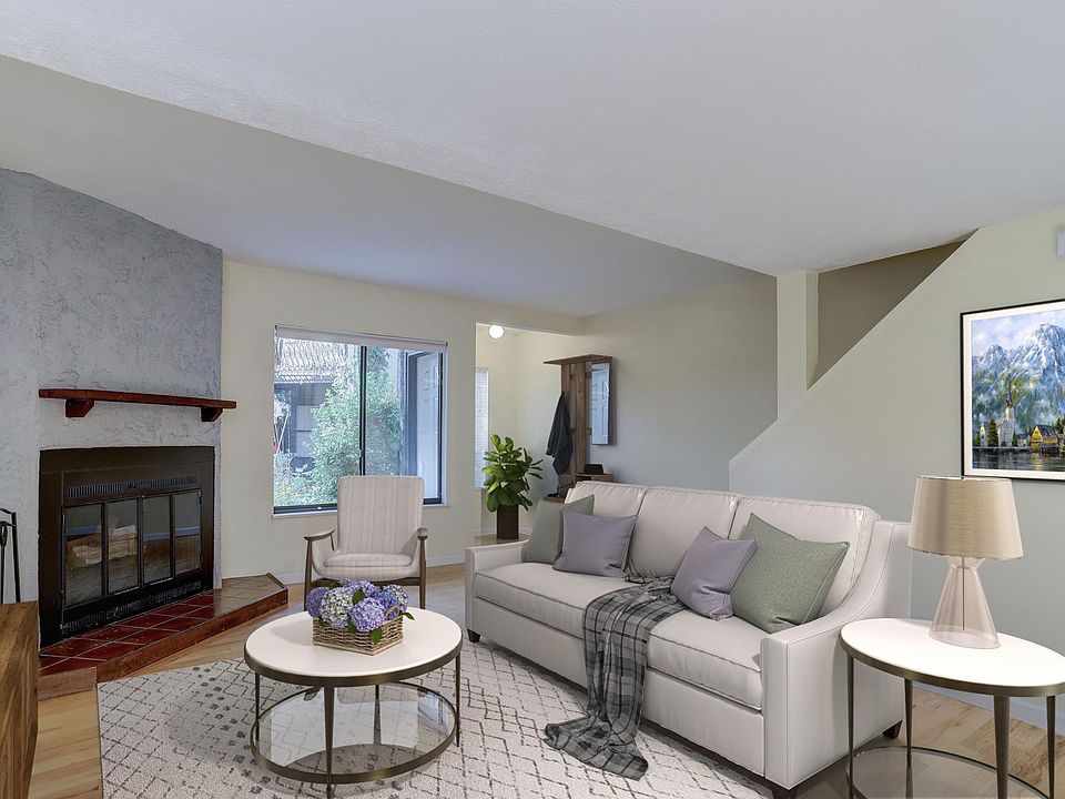 Virtually staged living room - South facing entry provides great light