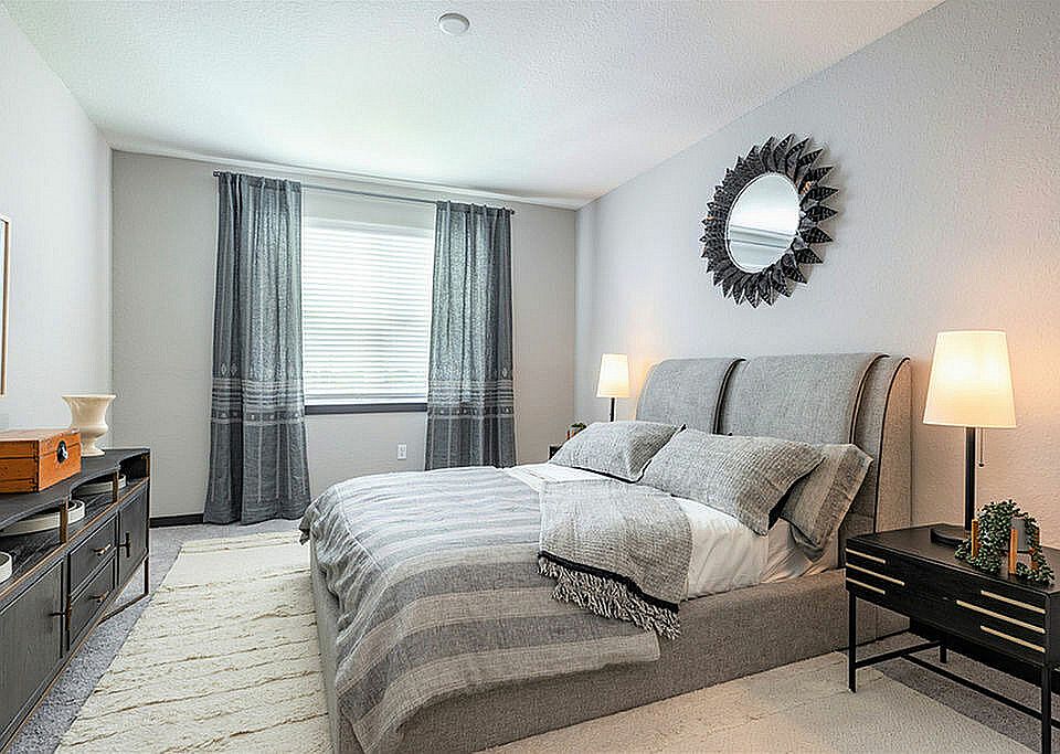 Experience tranquility in this beautifully designed modern bedroom.