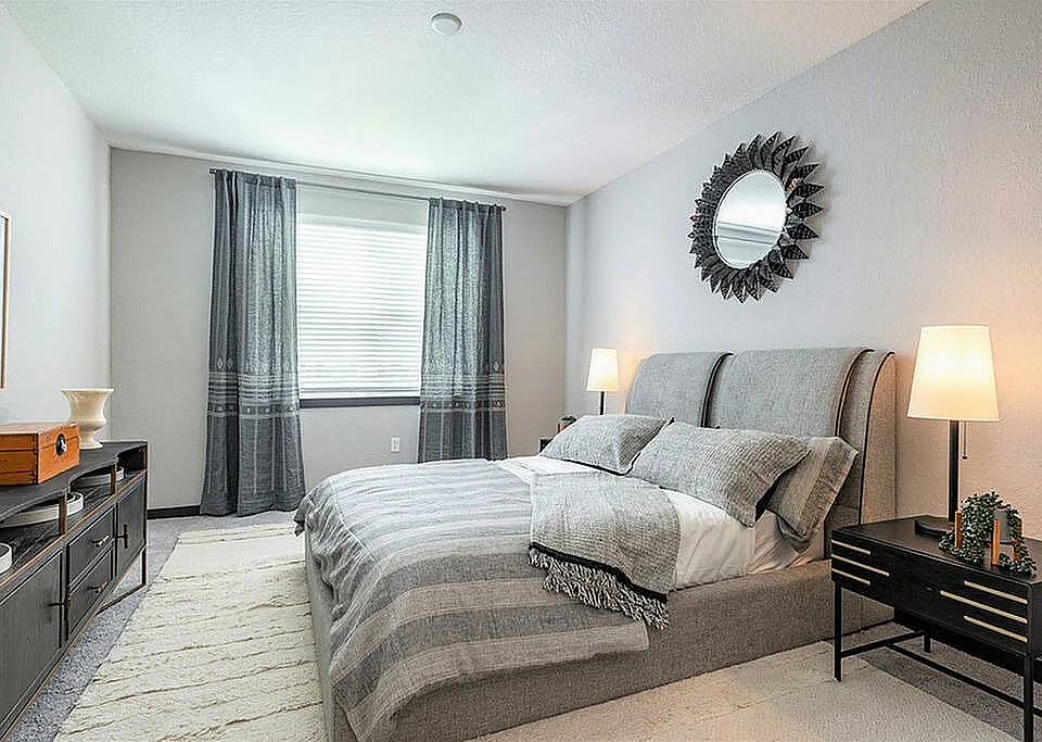 Experience tranquility in this beautifully designed modern bedroom.