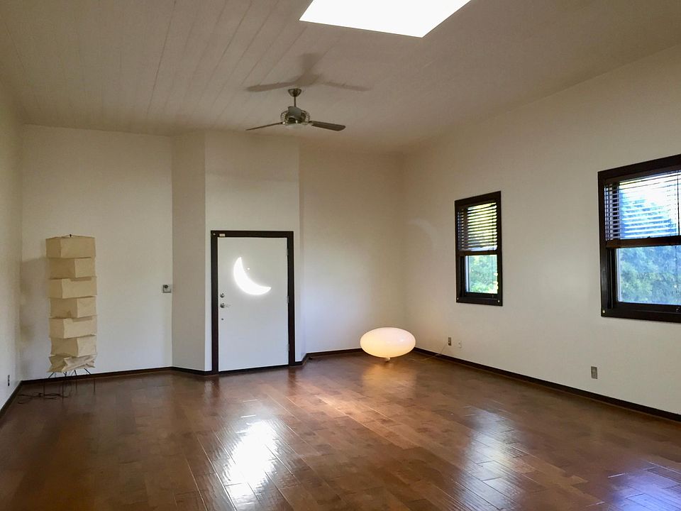 Upper Level. Open floor plan, high ceilings w skylight.