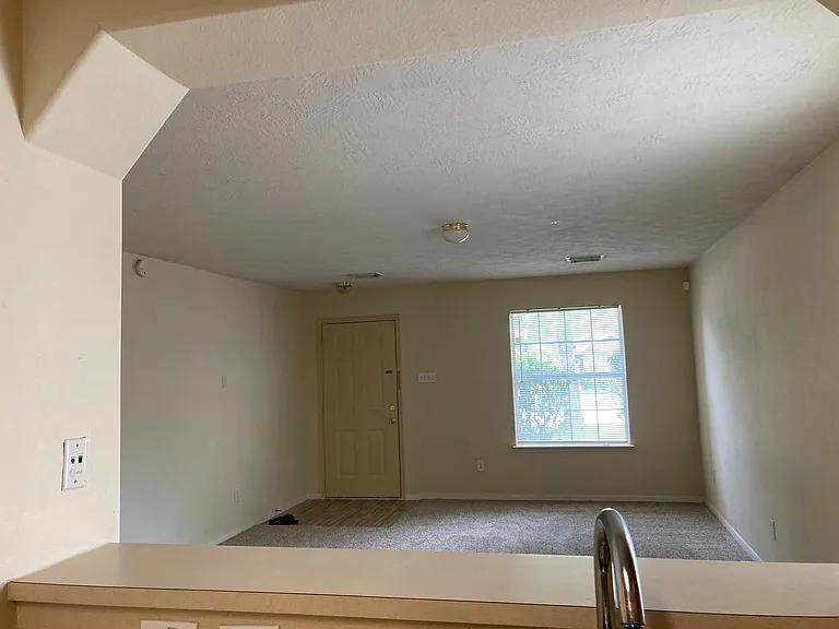 Living room and front yard (viewed from Kitchen)