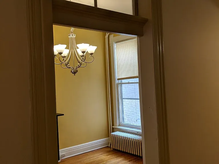 looking into dining room from downstairs hallway
