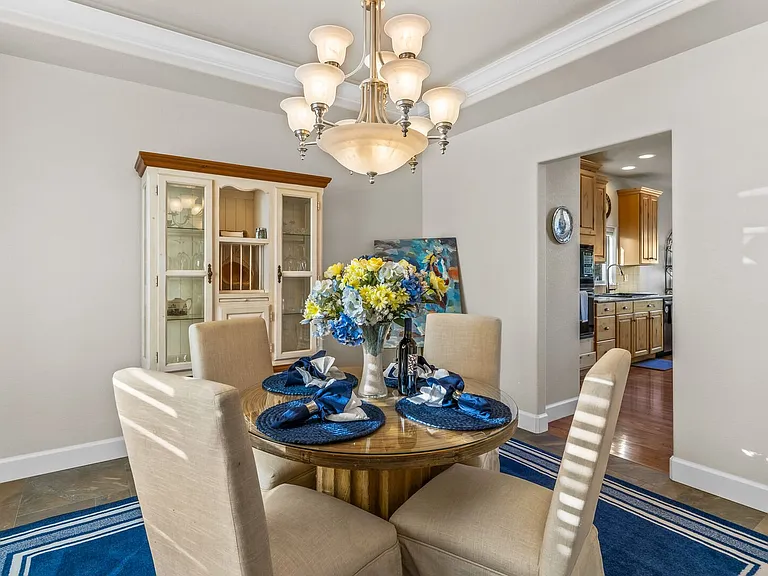 Dining room just of the kitchen for formal seating.