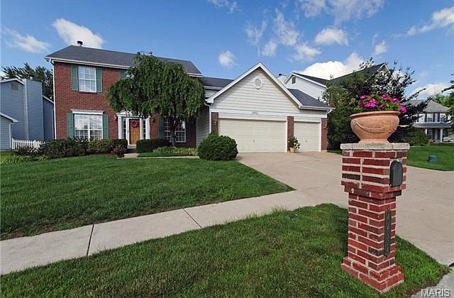 Lush grass and landscapng at 4482 Forder Ridge