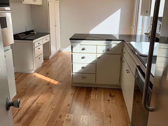 Large kitchen with plenty of storage.