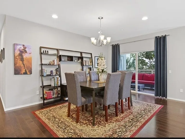 The balcony is just beyond the dining room