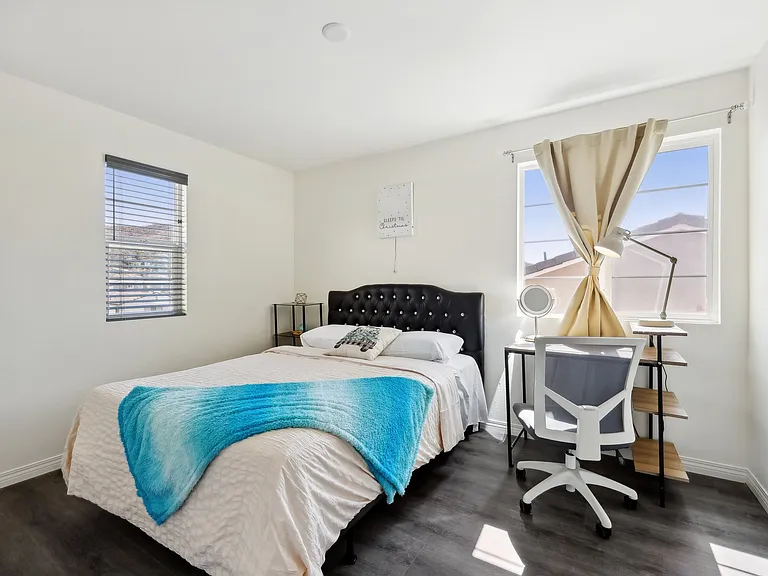 Bright and inviting, this bedroom bath is filled with natural light.