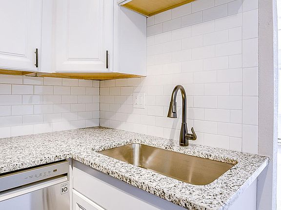 Completely renovated unit kitchen.