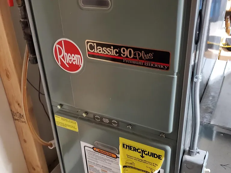 Furnace and A/C Unit in Utility Room in Lower Level