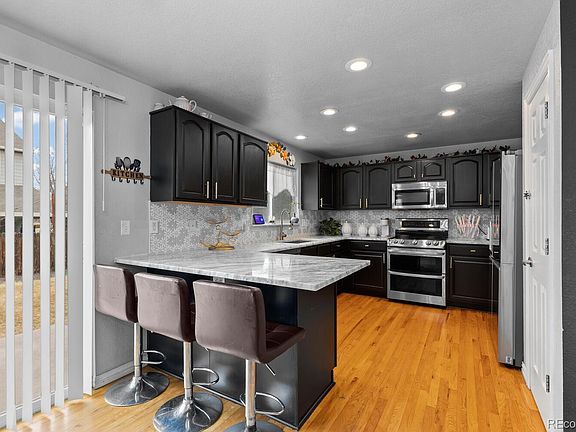 4th image of 11073 E 115th Avenue