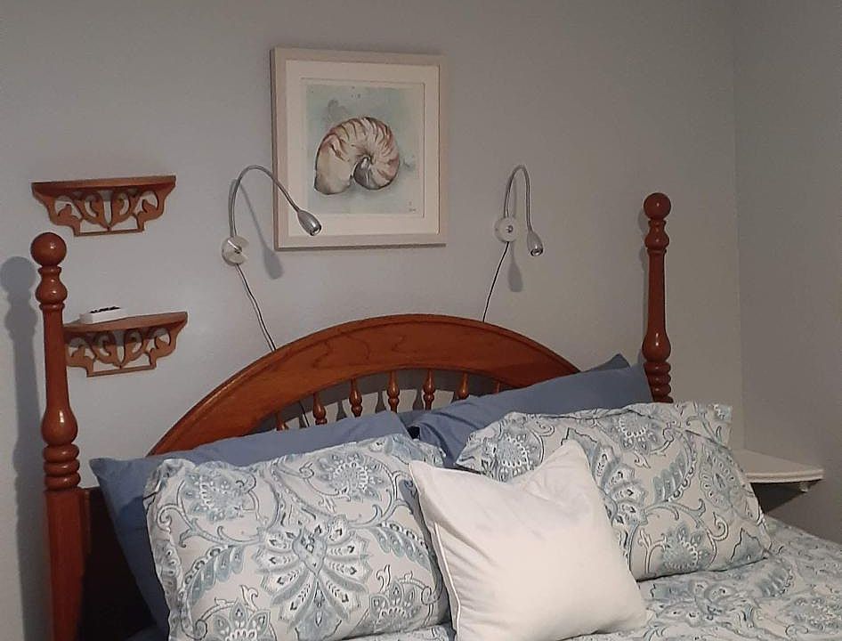 queen bedroom with skylight