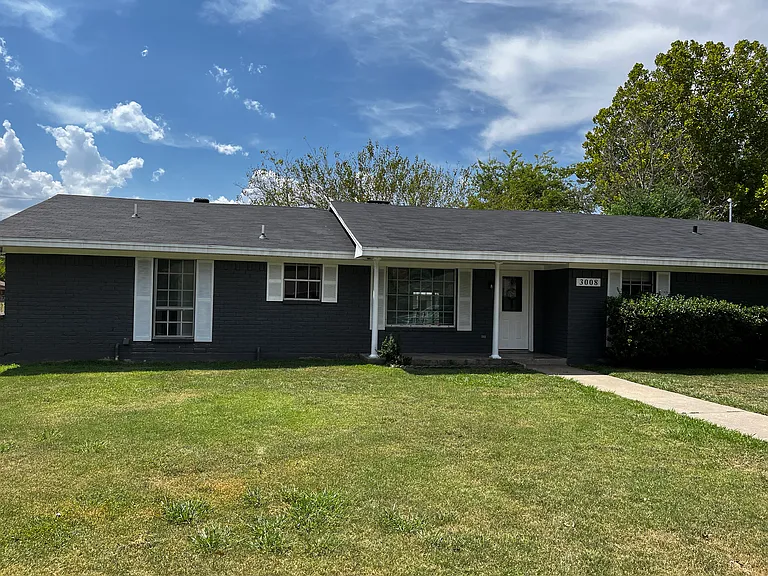 3008 Arapaho Rd — Photo 1