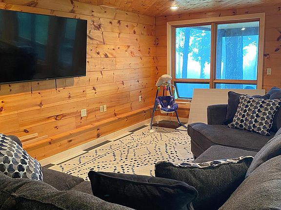 Basement Game Room Living Room with Pool Table and Foosball