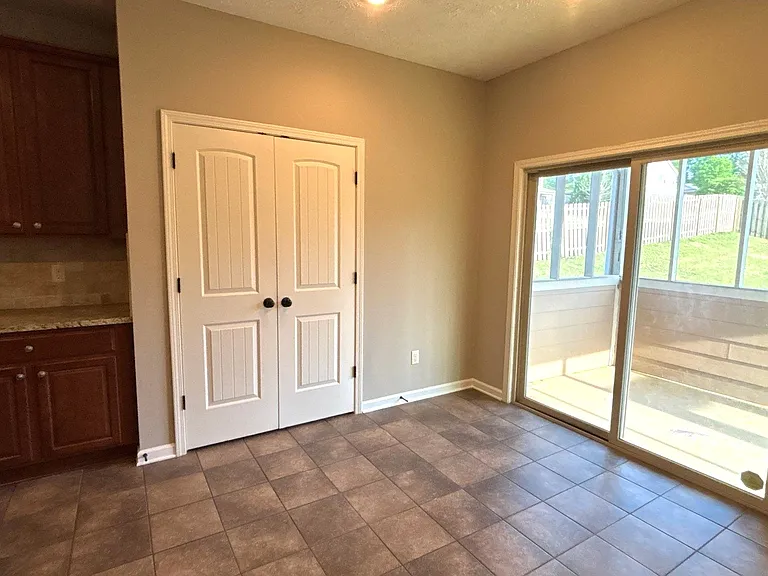 Eat in Kitchen area off covered back porch