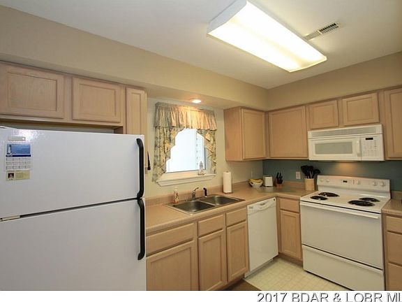 Kitchen w window over sink