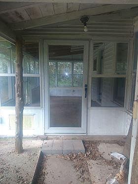 Outside the glassed in porch.