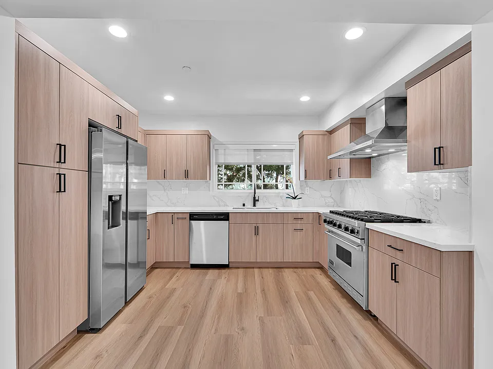 Photos shown are of a recently renovated unit and are representative of the finishes and design of what the renovated units at 11848 Kiowa Avenue will look like