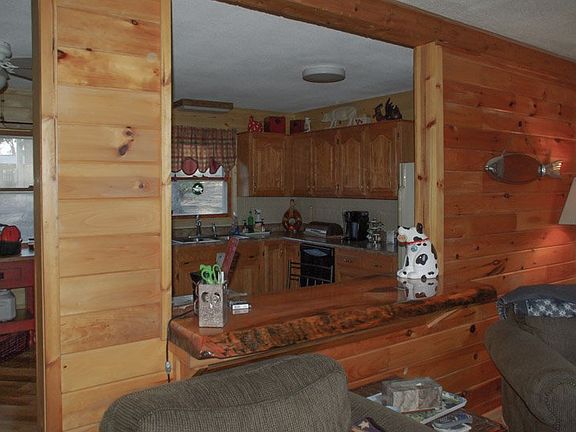 Opens into kitchen area