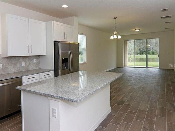 Kitchen and family room with water front view