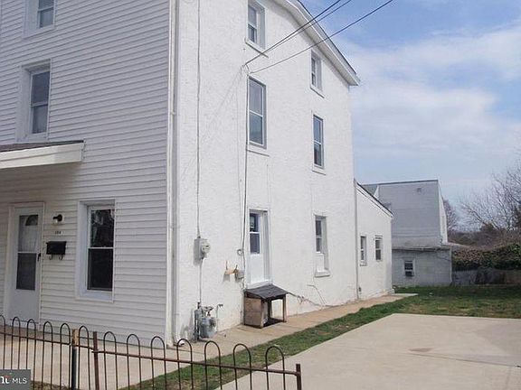 Side of House, Driveway and Backyard