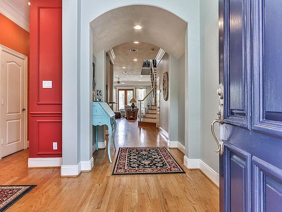 Beautiful gleaming hardwoods reflect the natural light which abounds throughout the home.