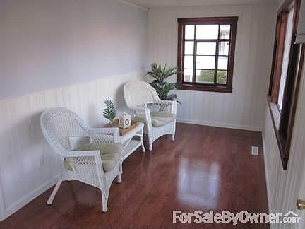 Front Porch Photo : The front porch is pictured with lots of natural light.