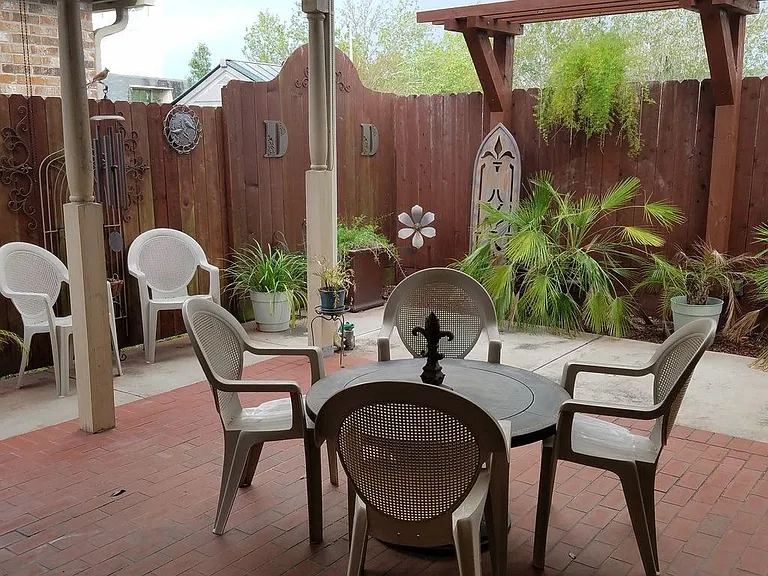 fenced back patio & courtyard