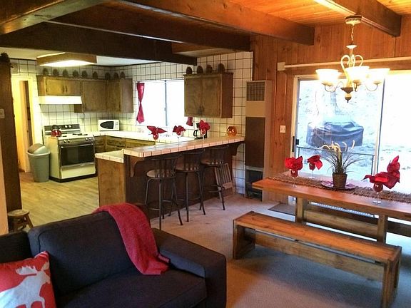 Kitchen with bar and bar for additional dining.