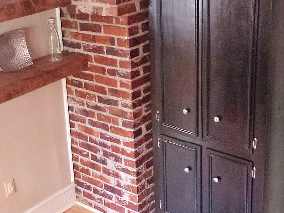 Kitchen with Exposed Brick