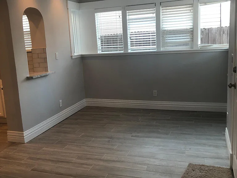 Sunroom west side with pass through into the Kitchen