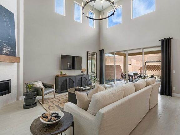 Enter the Yucca home design to a beautiful and open first floor with soaring ceilings in the gatheri