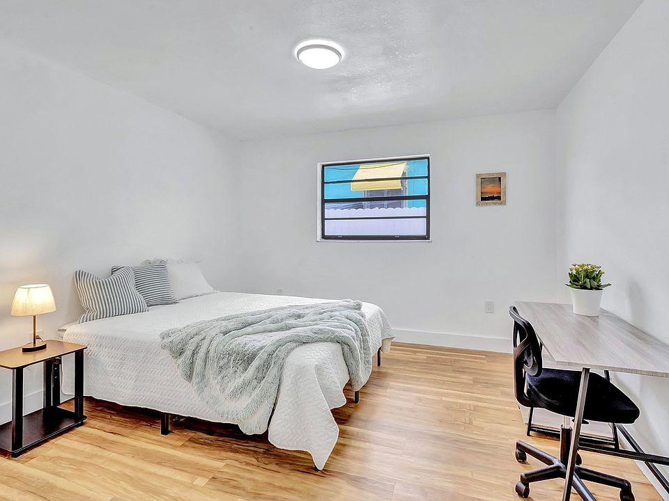 Large room: new memory foam queen size bed with a matress cover. Comes with a night table, lamp, desk and a chair.