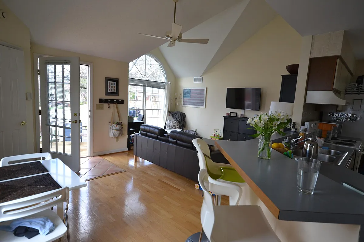 Bar off kitchen, living area looking out to front deck. Vaulted ceilings - 1236B W 4th St