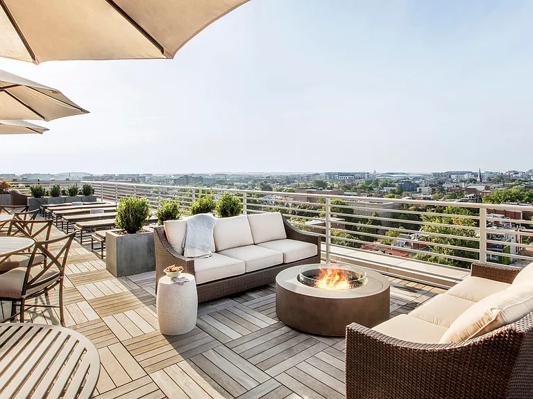 Take advantage of the glowing rooftop firepits at any time of year