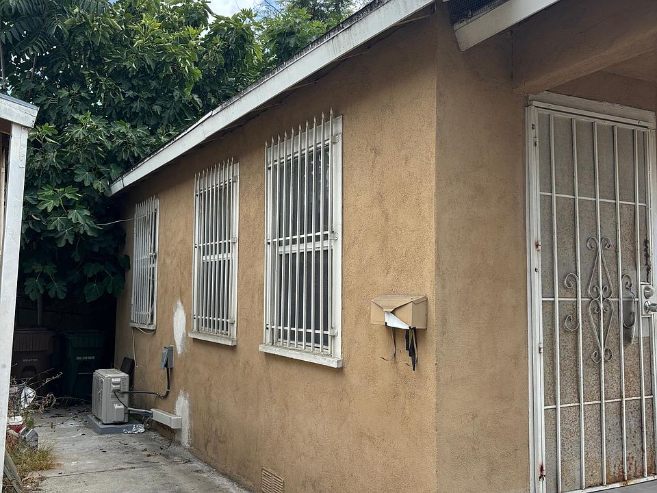 Front, side view of house.