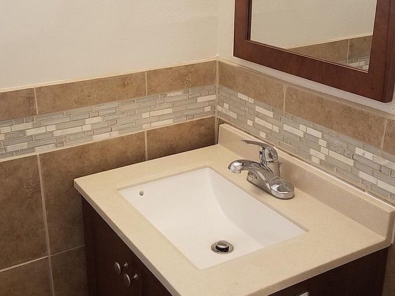 half bath with decorative tile