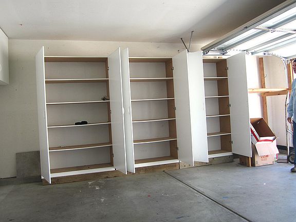 Illustrating HANDSOME BUILT-IN STORAGE, ENCLOSED SHELVING, USEFUL FOR WHATEVER WORKS FOR YOU.