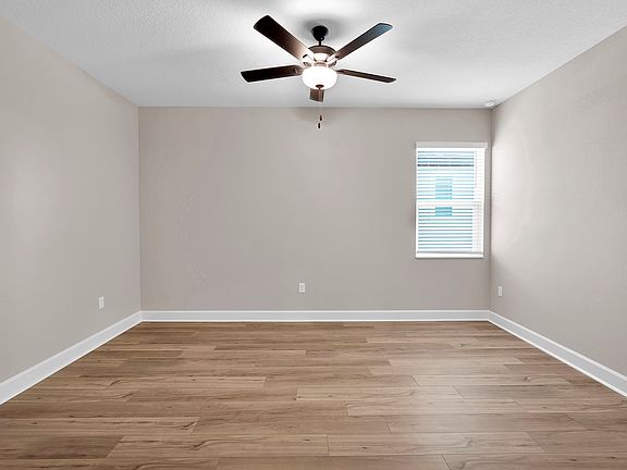 Rest and relaxation await in the master bedroom
