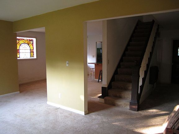 From front room looking into dining room to the L and living room to the R