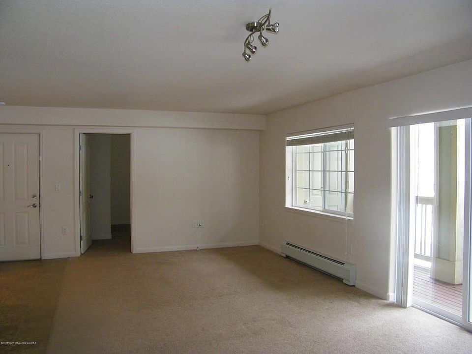 Living room Left side, entry to 3rd Bedroom, front door, sli