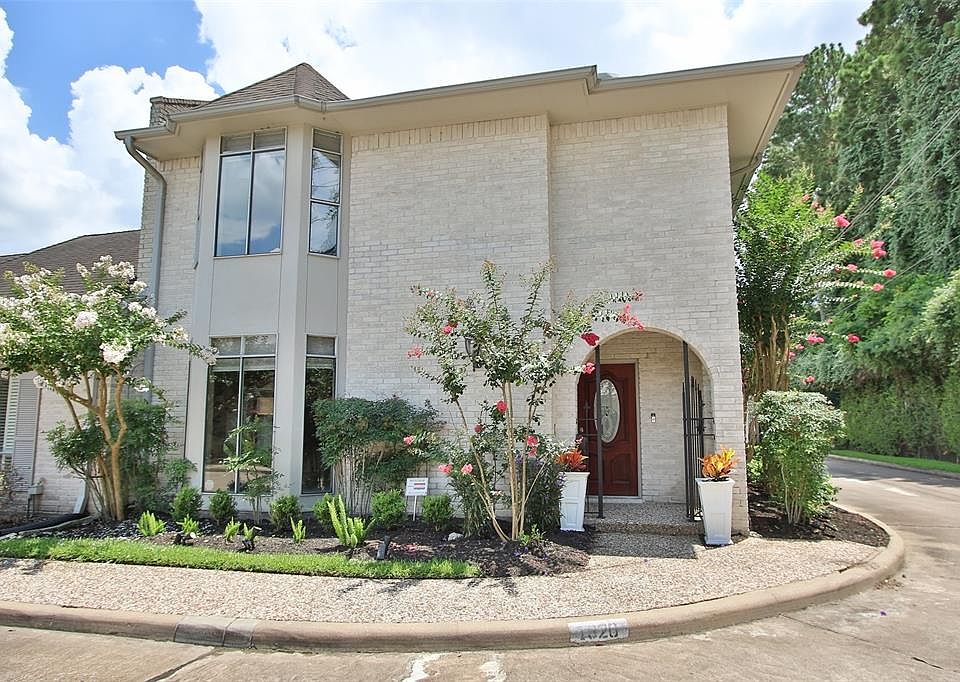 This spacious Woodlake town home is located on a corner lot and surrounded by lush landscaping and a view of mature trees. The oversized front windows allow natural light to flow through the home. The gated entry and ring doorbell offers added securi