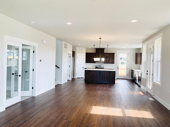 View of living room and kitchen room from a distance.