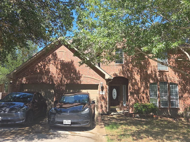 Two car garage on a quiet street