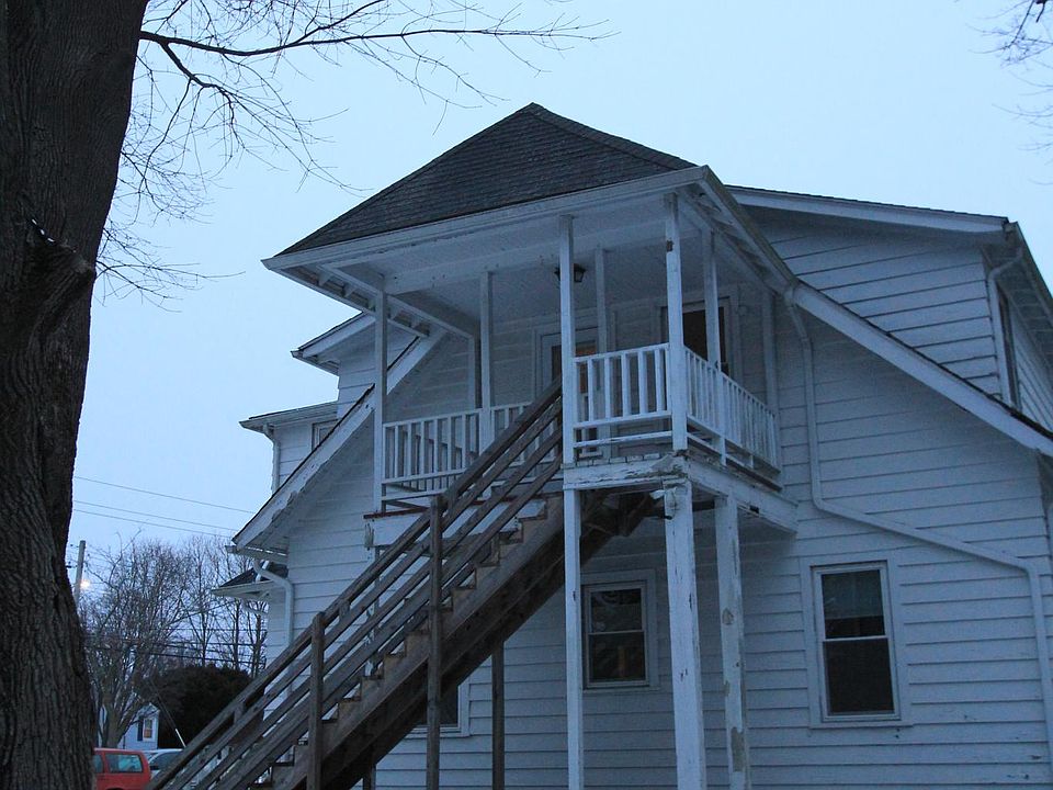Apartment porch and entryway from parking area.