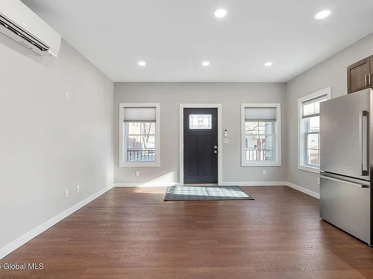 View of the front door from the kitchen / living room.