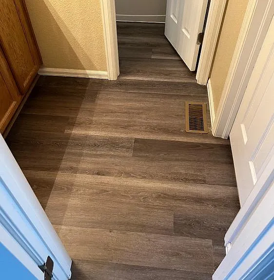 Entry to the Jack& Jill bathroom, located between the upstairs bedrooms. Note that the sink area is separate from the tub area.