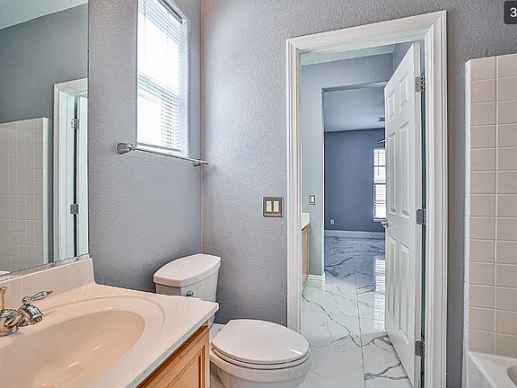 4th image of 9956 Village Walk Ave